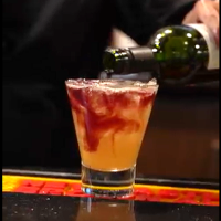 Bartender making drink at Kobe Japan Restaurant bar